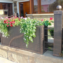 Kovaný kvetináč v plote - exkluzívne oplotenie s kvetináčmi vyrobené v umeleckom kováčstve UKOVMI