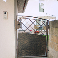 A forged gate with sheet metal